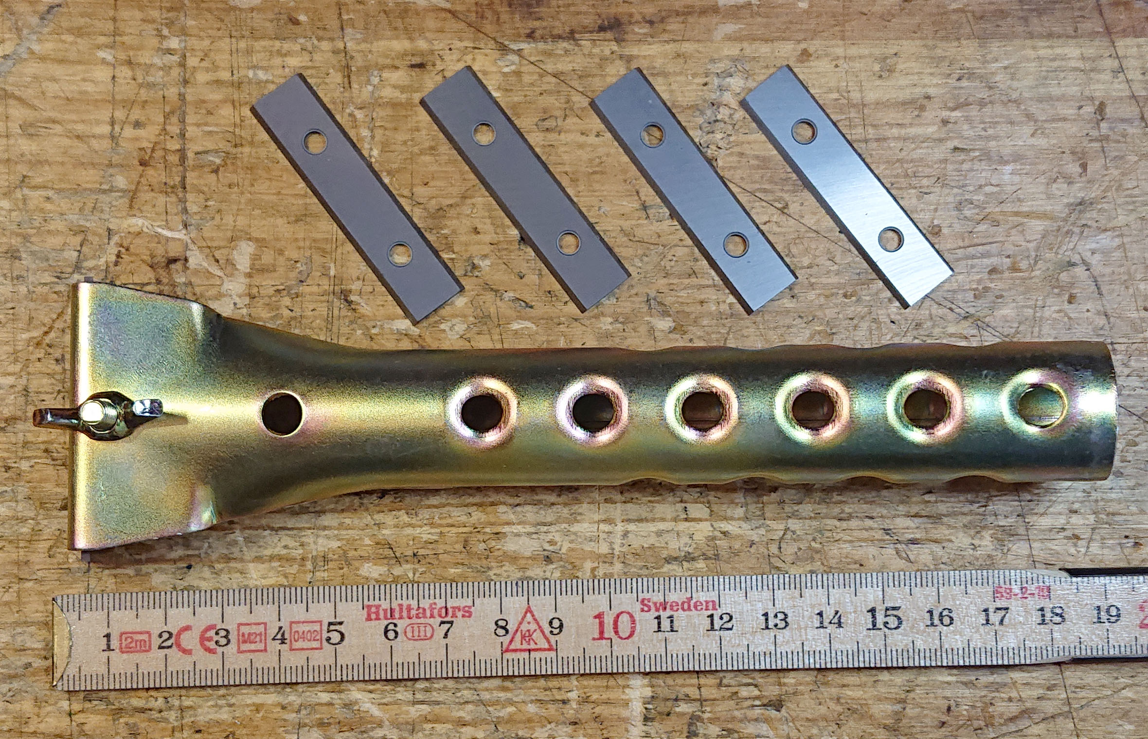 Färgskrapa med utbytbara Carbideblad.